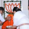 Applying chandan and kumkum